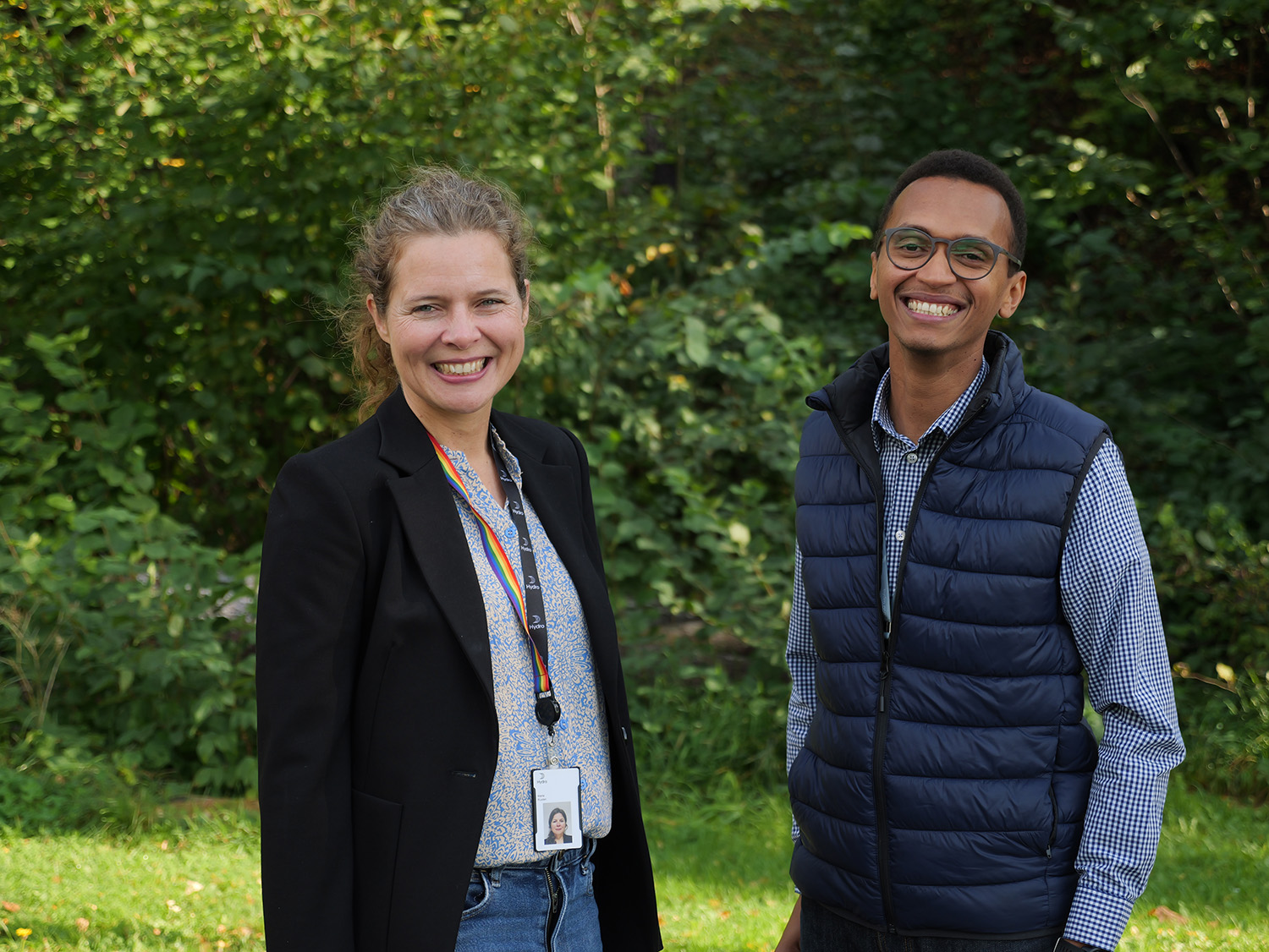 a man and a woman smiling