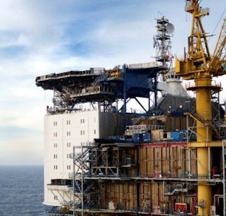 a large ship with cranes