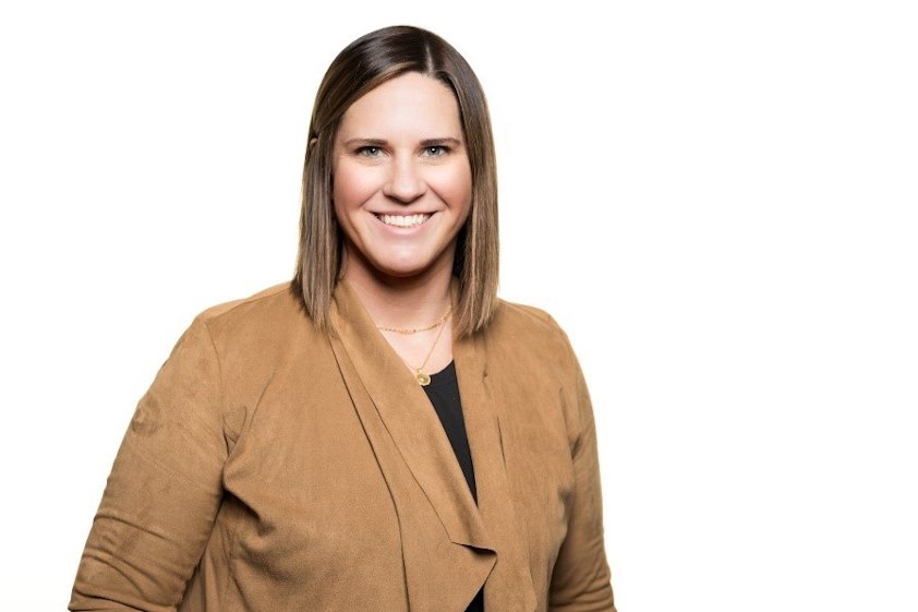 a person in a brown suit