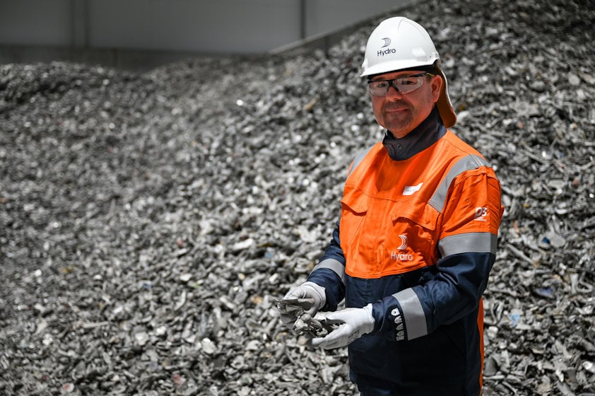 a person wearing a hard hat and safety gear