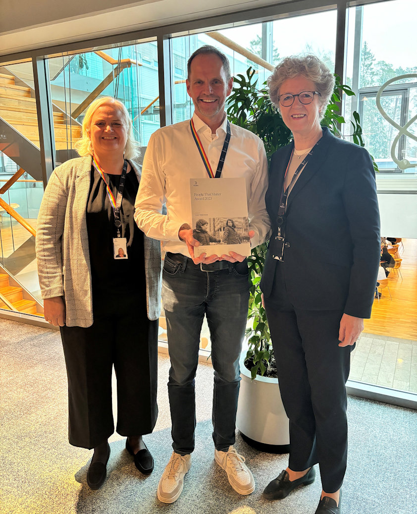 a group of people posing for a photo