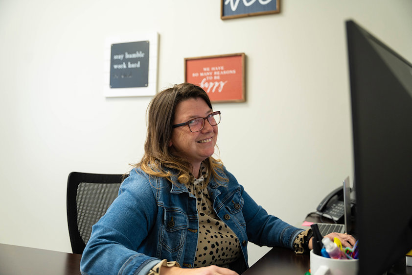 a person sitting at a desk