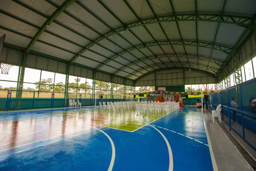 a swimming pool with people in it