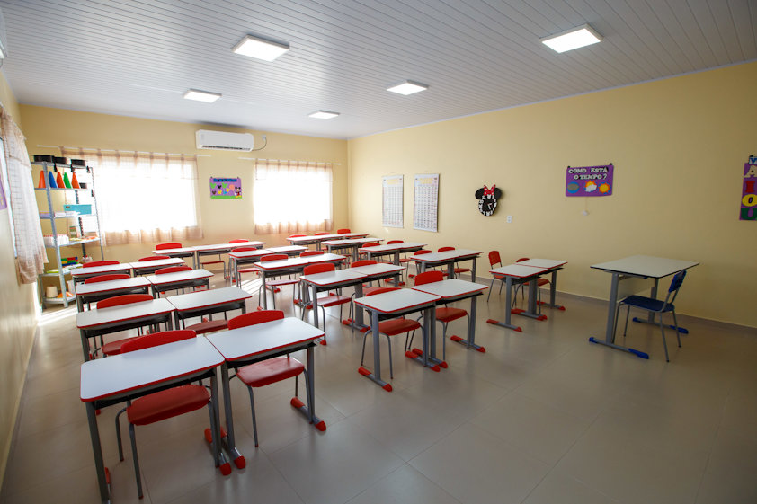 a room with tables and chairs
