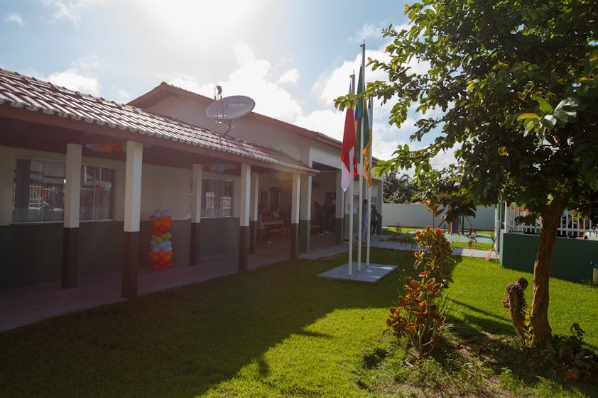 a building with a flag in the front