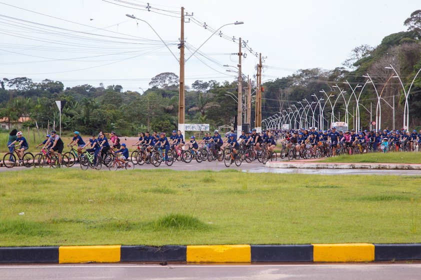 a group of people riding bikes
