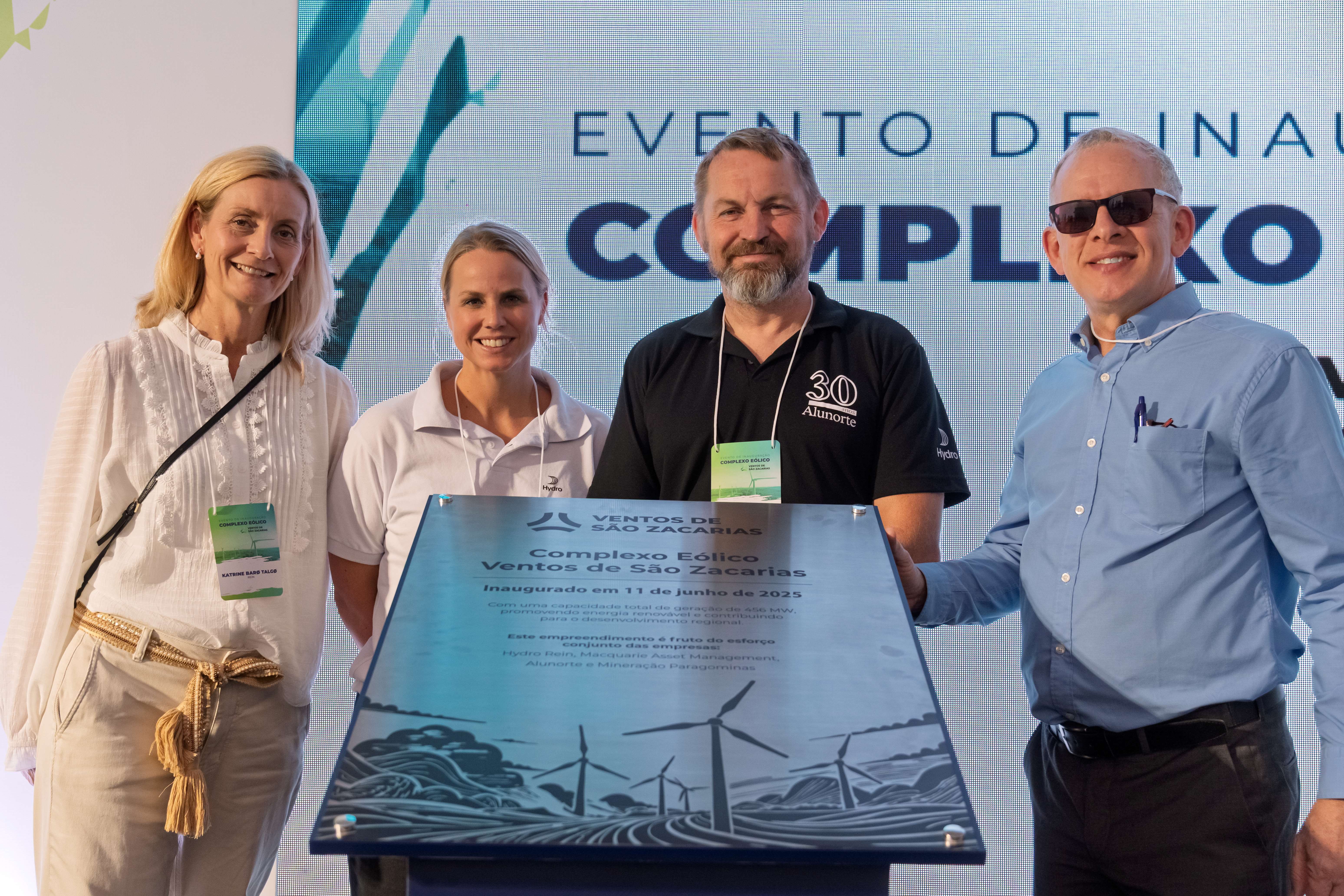 a group of people holding a sign