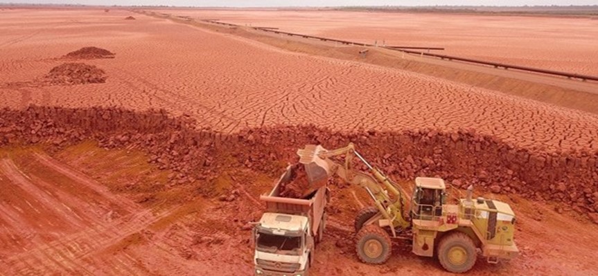 a few farm vehicles in a field