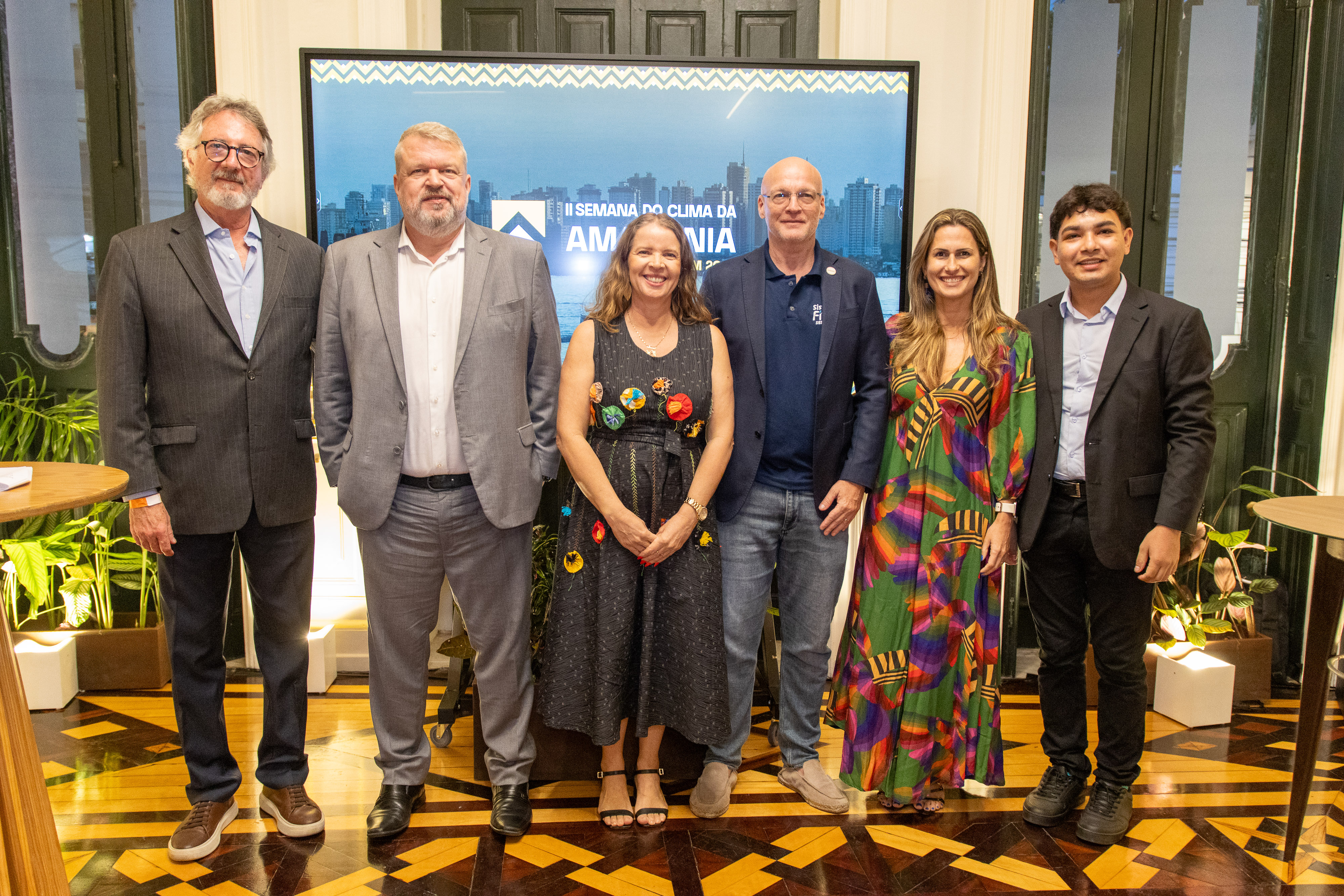 a group of people posing for a photo