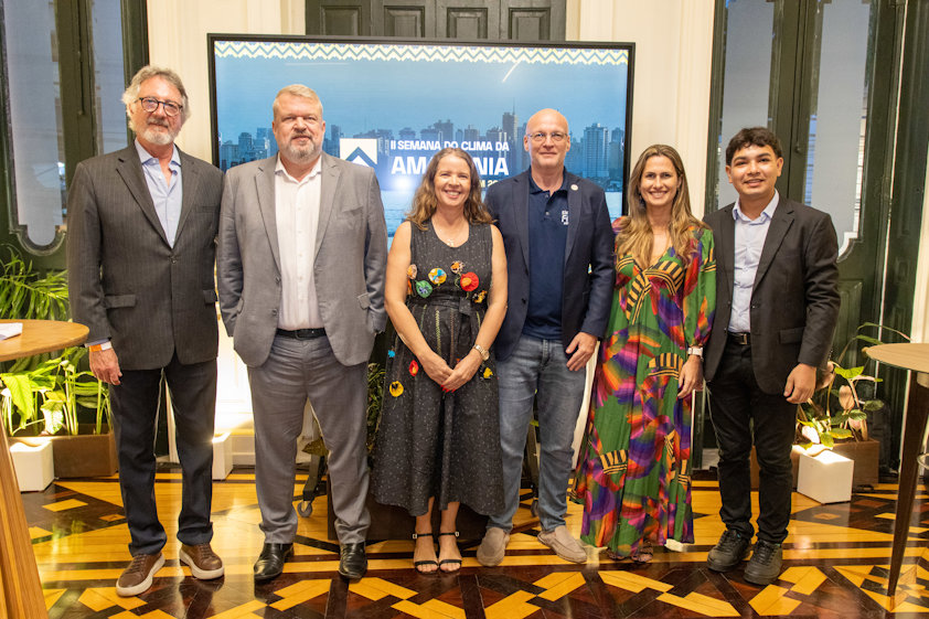 a group of people posing for a photo