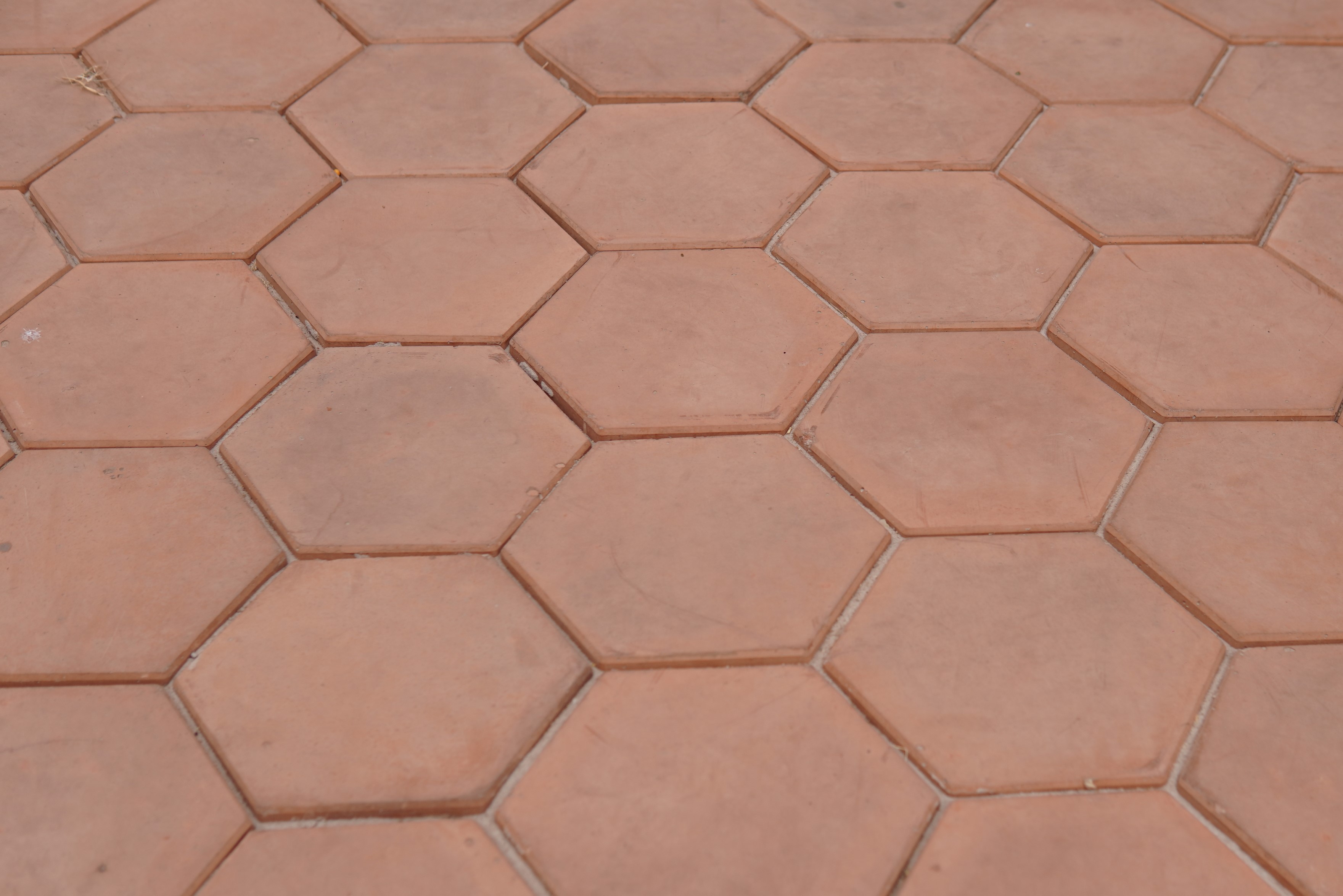 a close up of a hexagon tile floor
