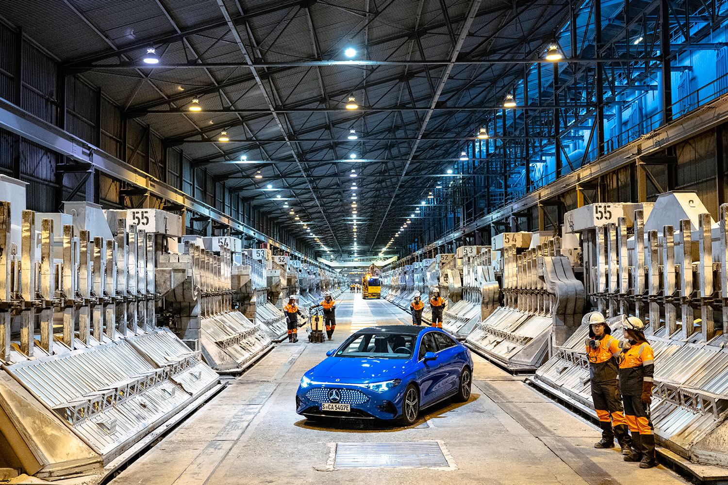 The fully electric Mercedes-Benz CLA in the electrolysis hall at Hydro Årdal, where Hydro produces low-carbon aluminium for European industry.