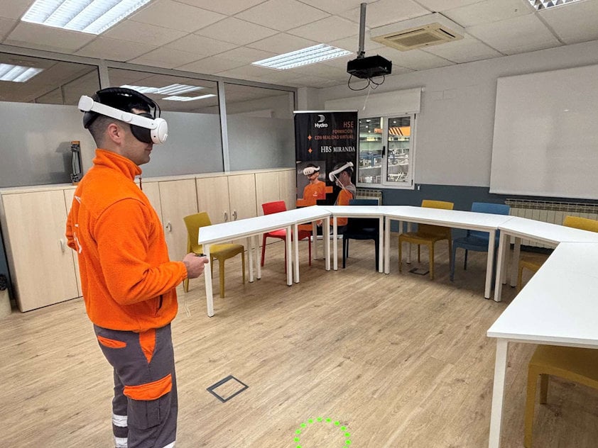 a man wearing goggles in a room