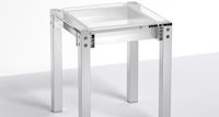 a white table with a metal frame