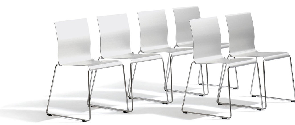 a group of white chairs