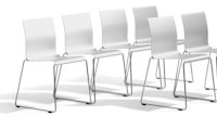 a group of white chairs