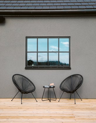 chairs and a table outside a building