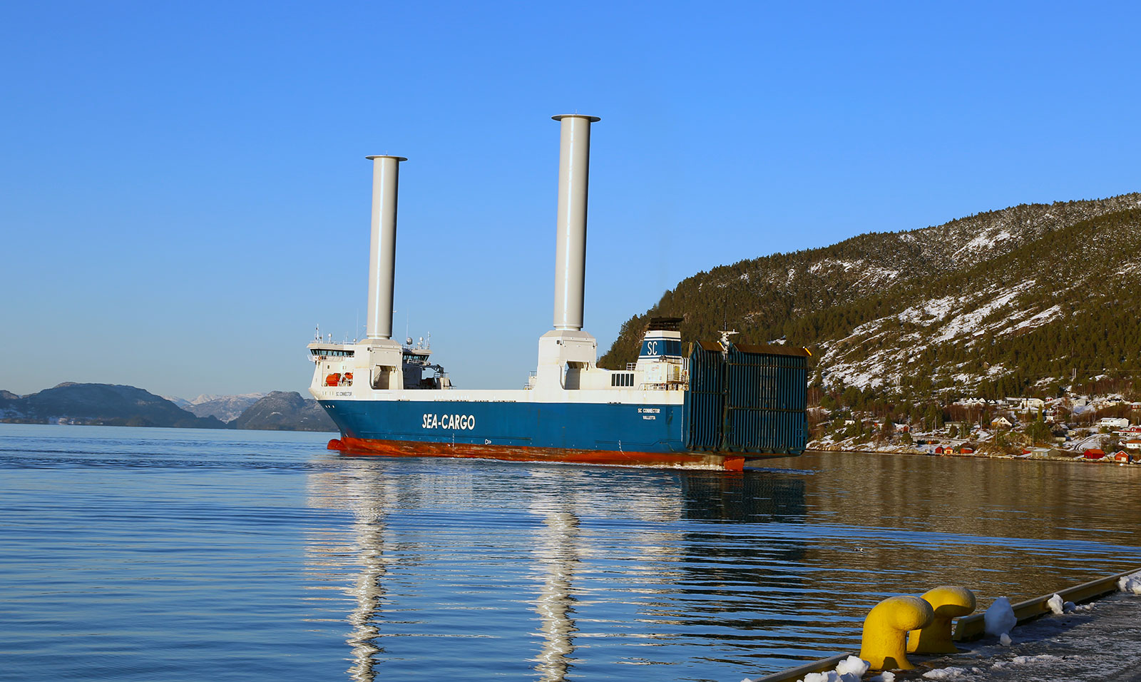 a large blue and white boat in the water