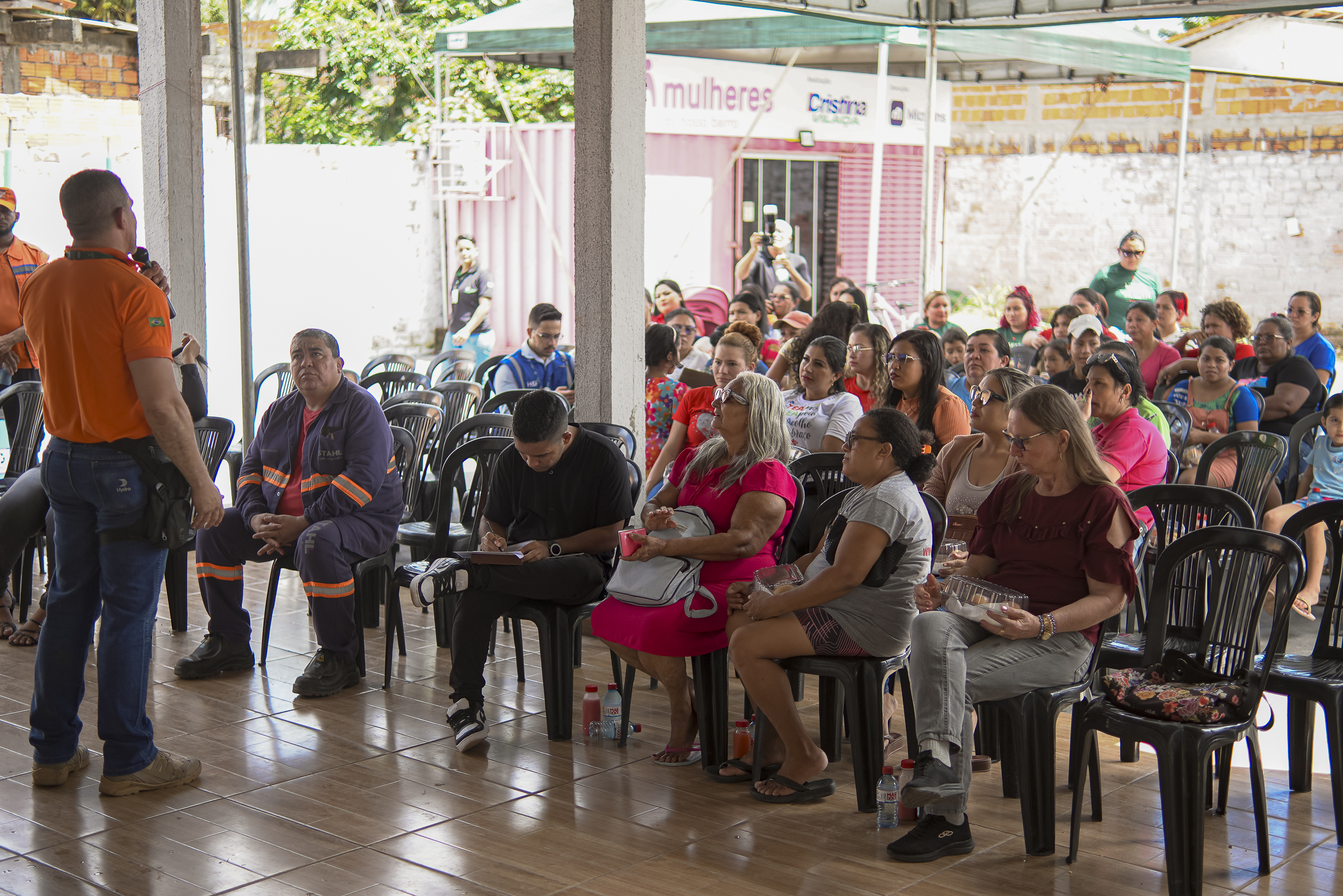 a group of people sitting in chairs