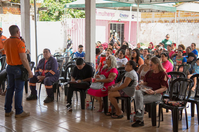 a group of people sitting in chairs