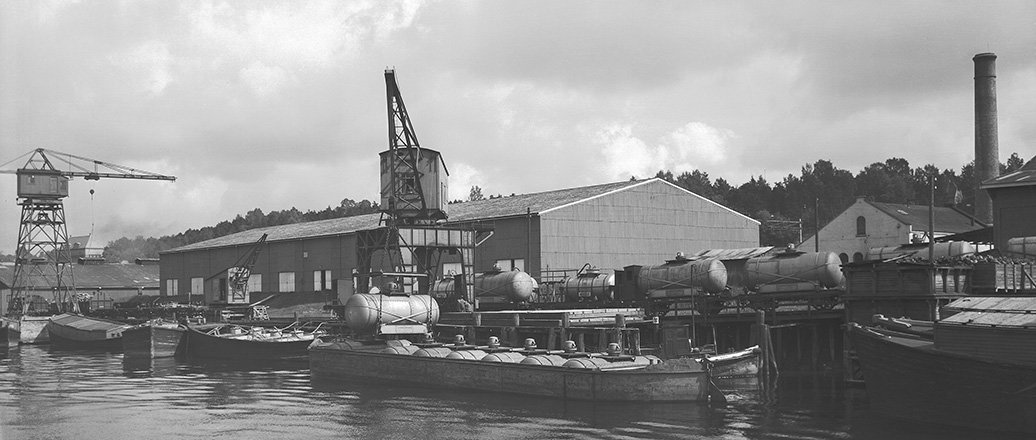 Warehouse and boats at dock, Menstad