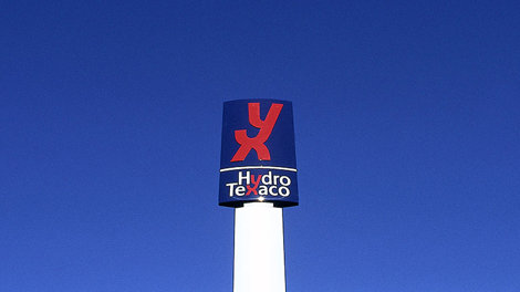 A sign with the Hydro Texaco common logo