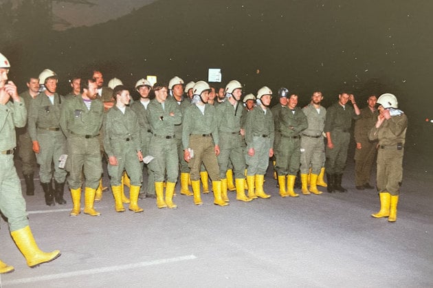 a group of people in military uniforms