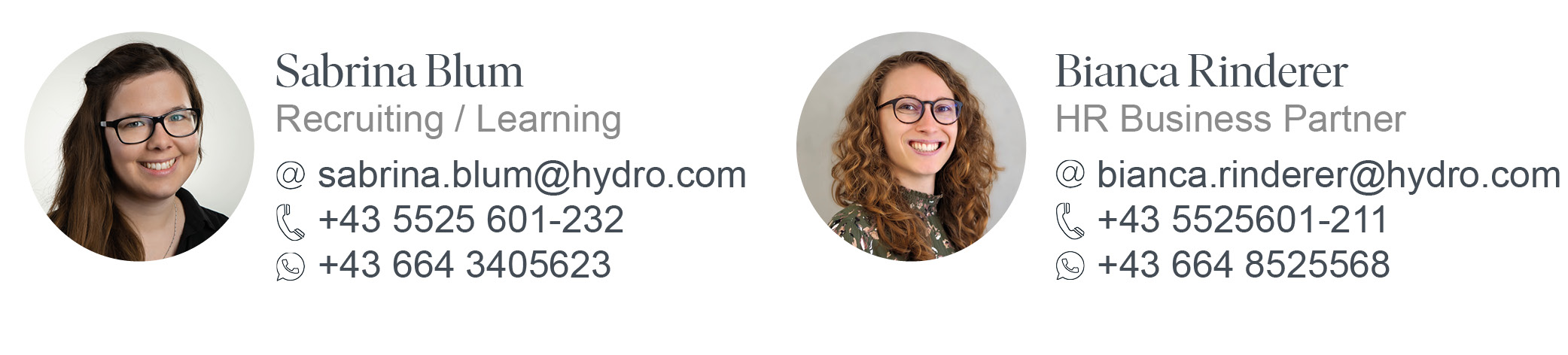 a woman with long curly hair wearing glasses