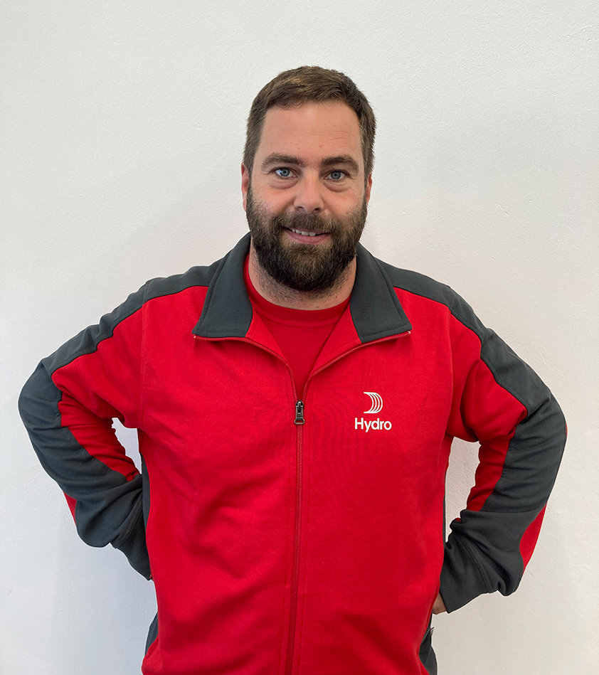 a man wearing a red jacket