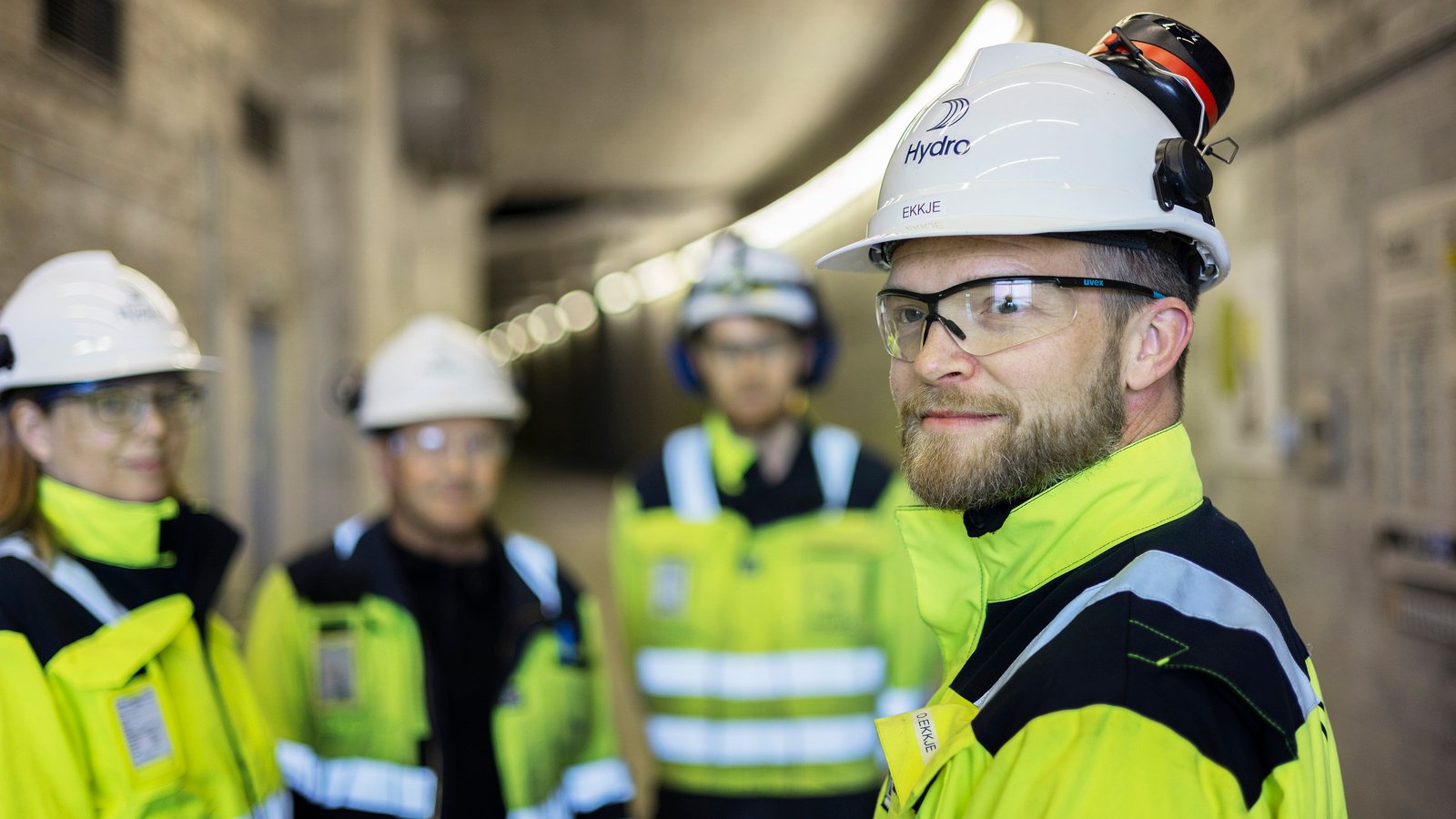 a group of men wearing helmets
