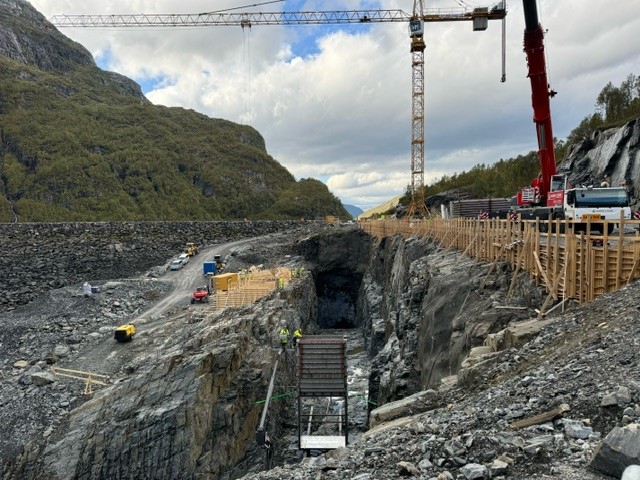 a construction site with cranes