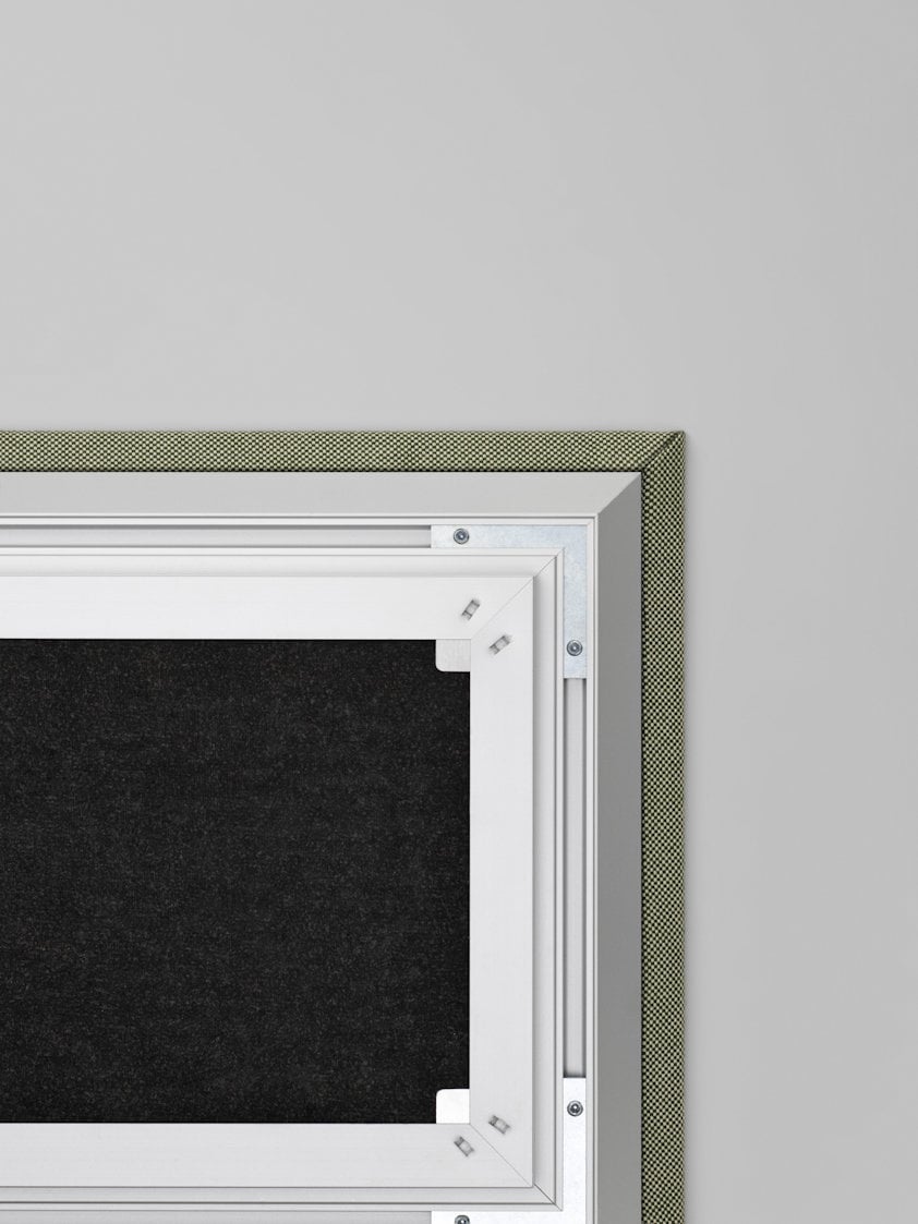 a white cabinet with a glass door