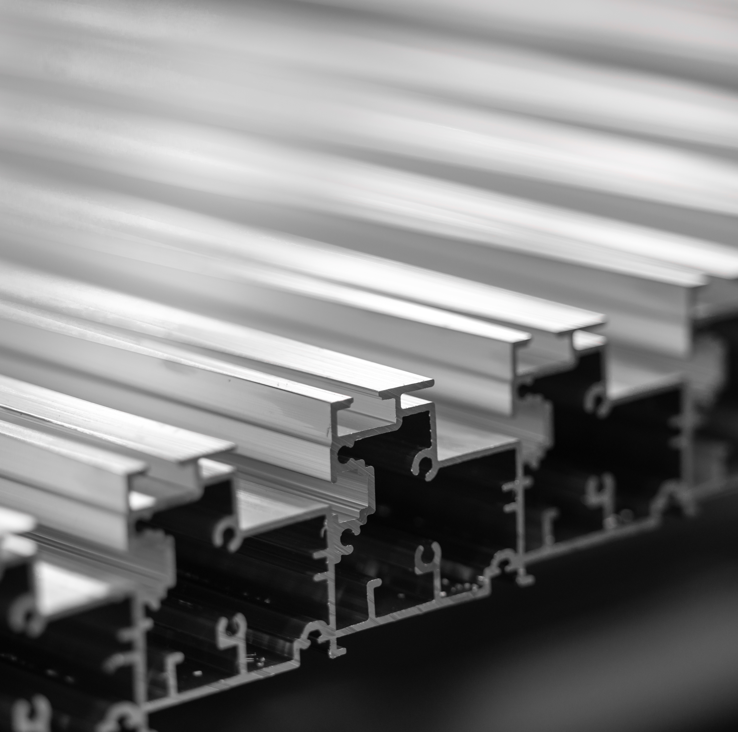 a black and white photo of a room with a light