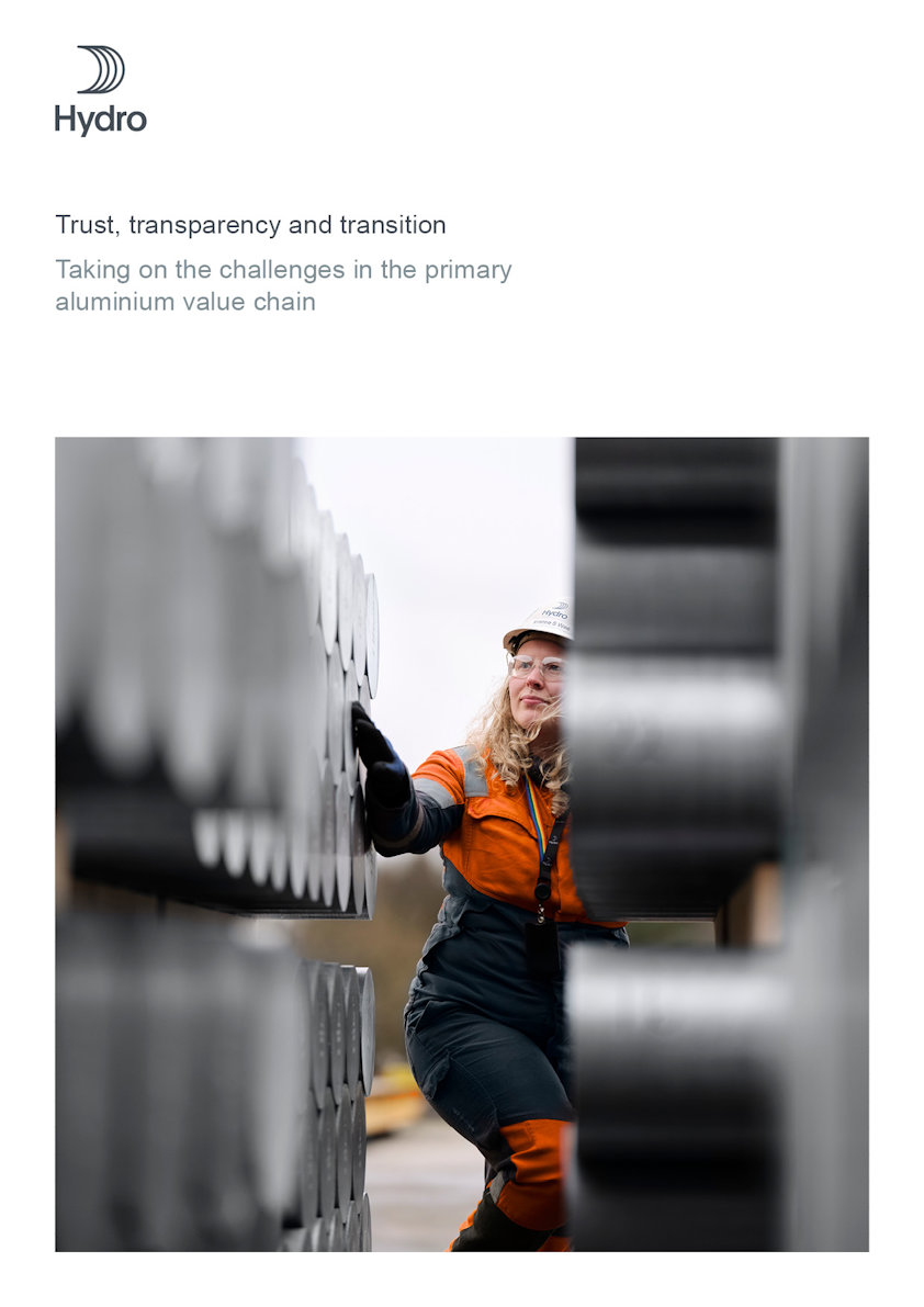 a woman wearing a hard hat and gloves