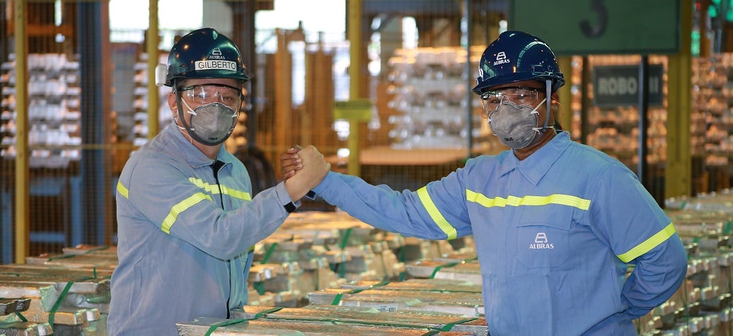a couple of men wearing helmets and goggles