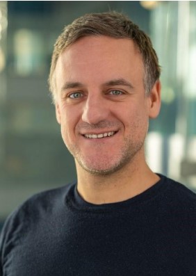 a man smiling for the camera