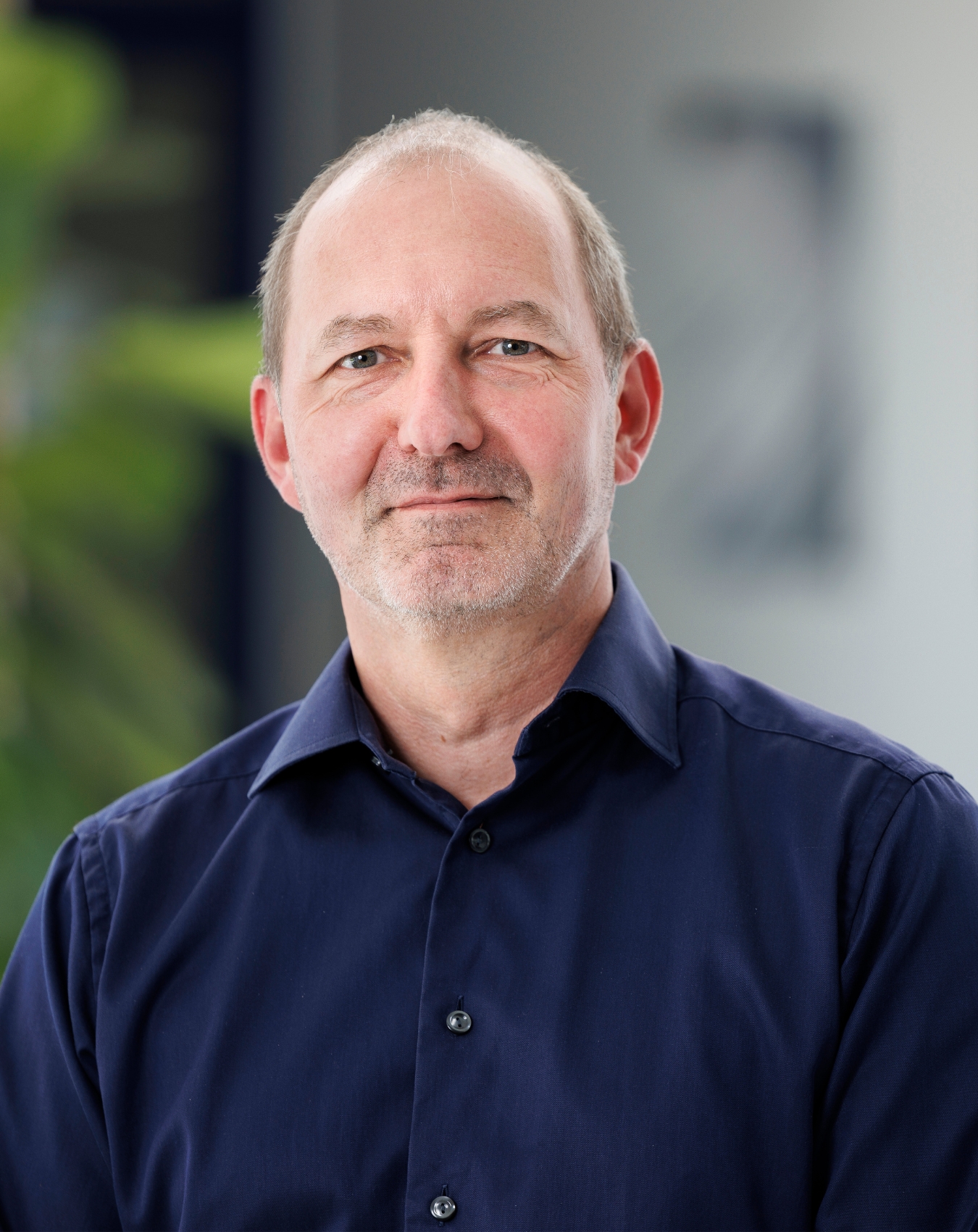 a man in a blue shirt