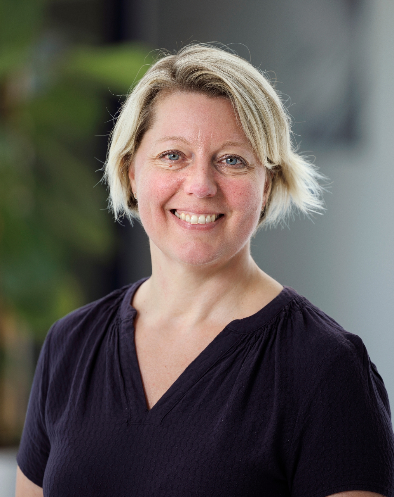 a woman smiling for the camera