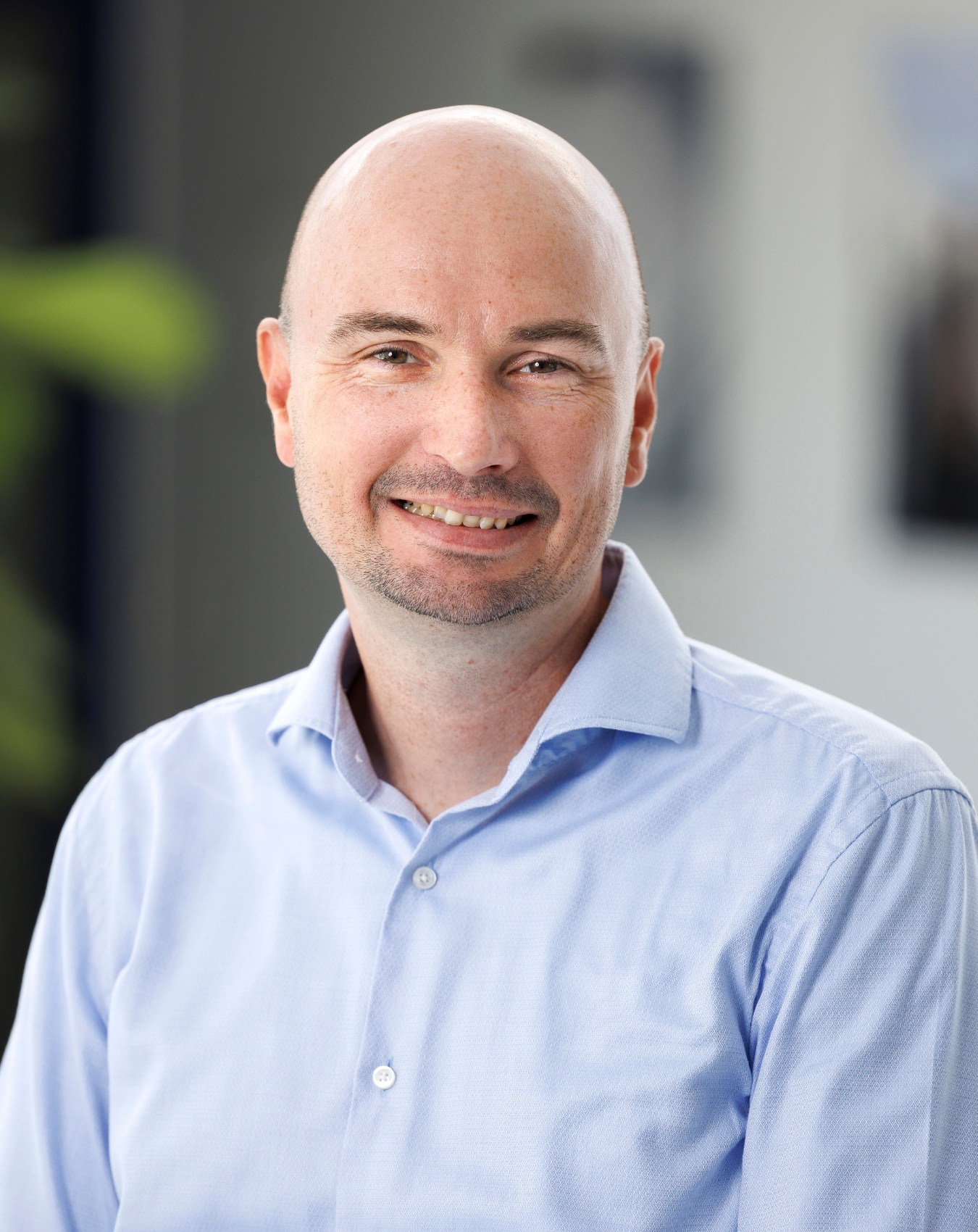 a man smiling for the camera