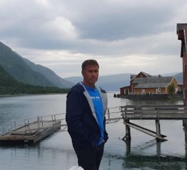 a man standing on a dock