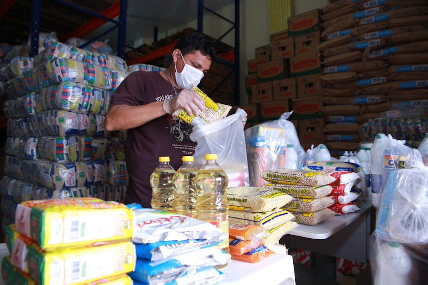 Food being prepared for delivery to families affected by the COVID-19 pandemic in Barcarena in Para state, April 2020.