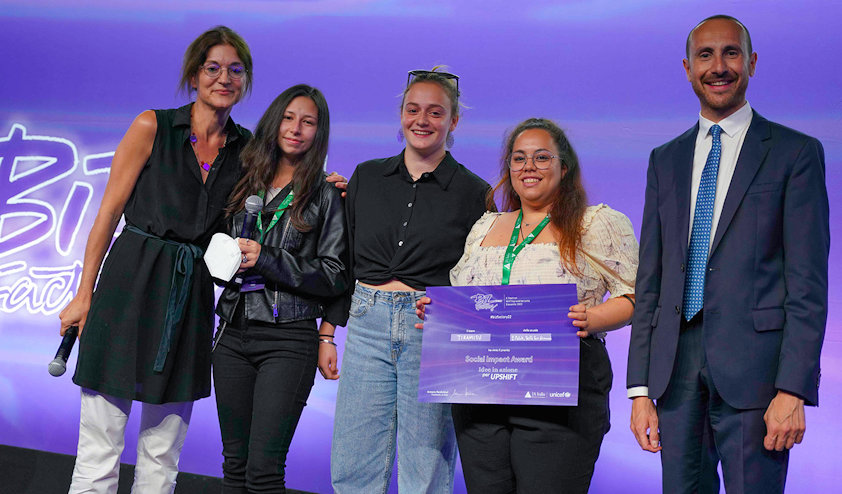 a group of people posing for a photo