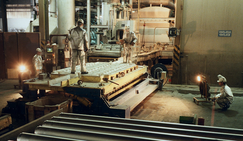 a group of men working in a factory