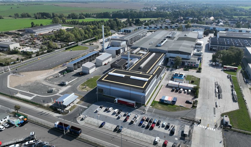 a factory and a parking lot