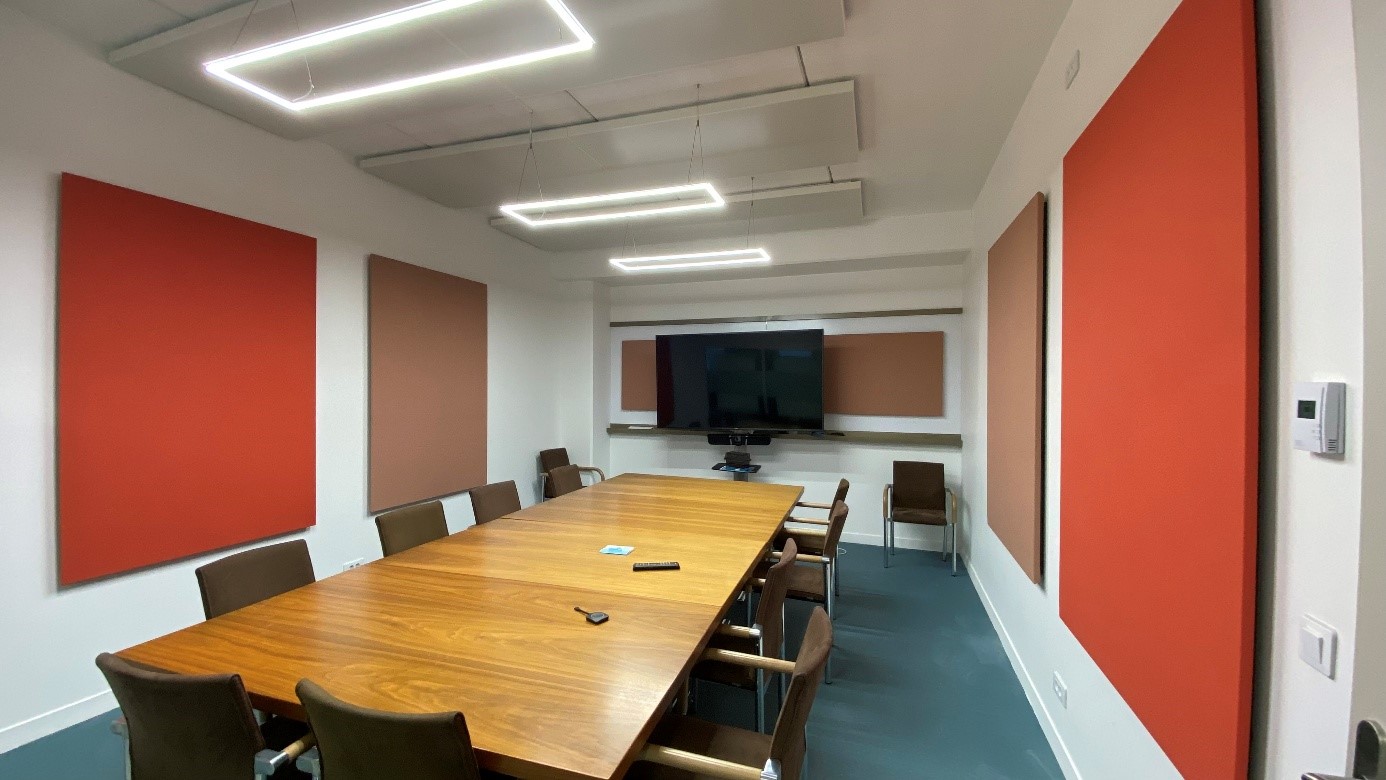 a room with a table and chairs