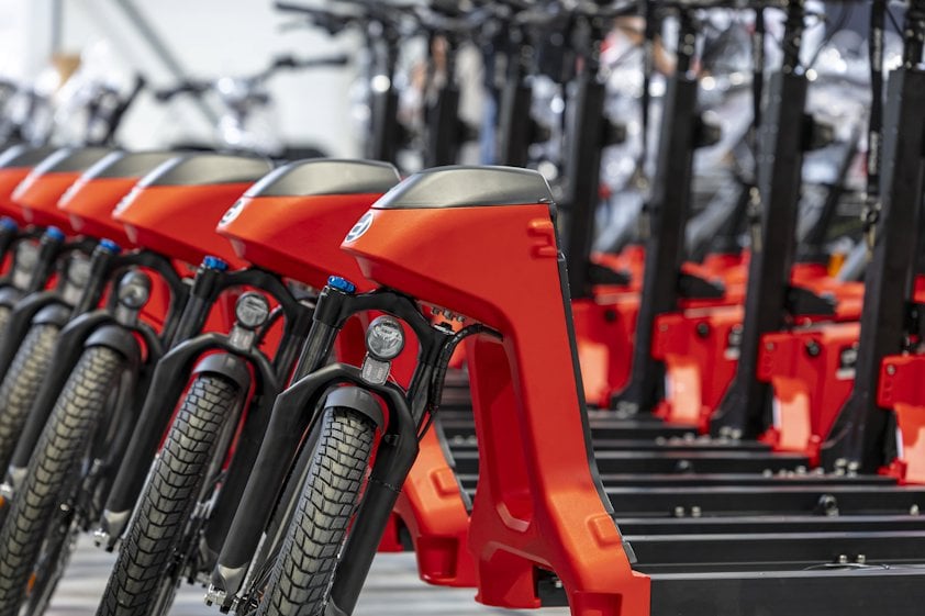 a red motorcycle with a black seat