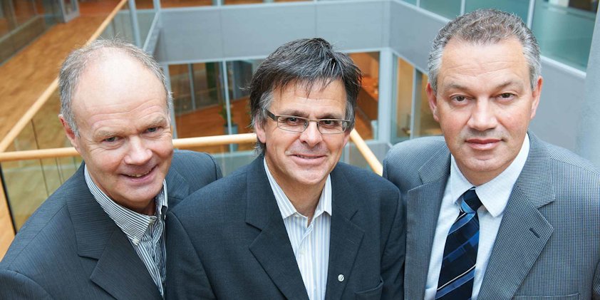 a group of men in suits