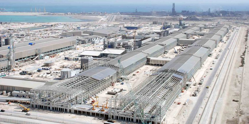 a large building with a lot of snow on the ground