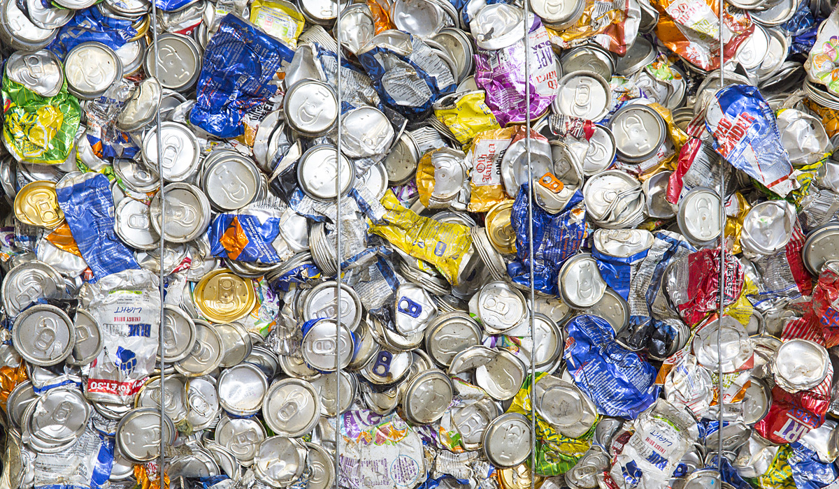 stack of flattened beverage cans