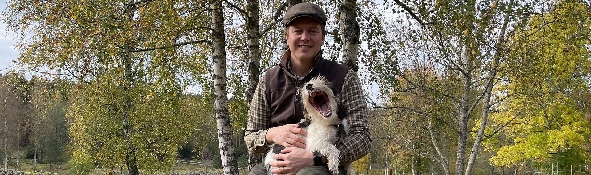 a person holding a dog